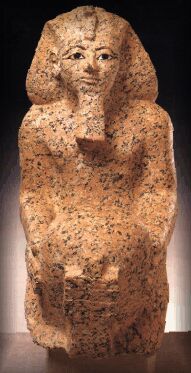 A red granite statuette of 'King' Hatshepsut